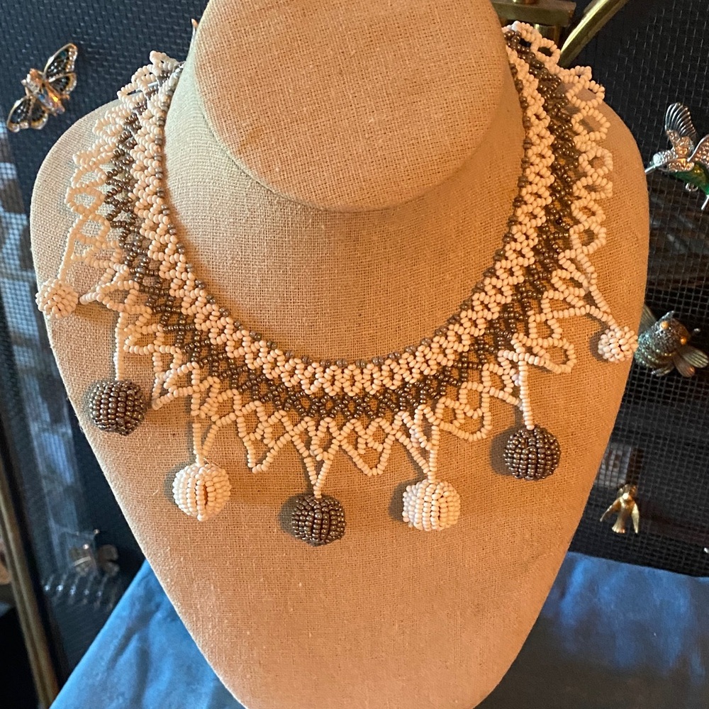One of a kind handmade vintage beaded necklace. Grey/silver and white. Very old.